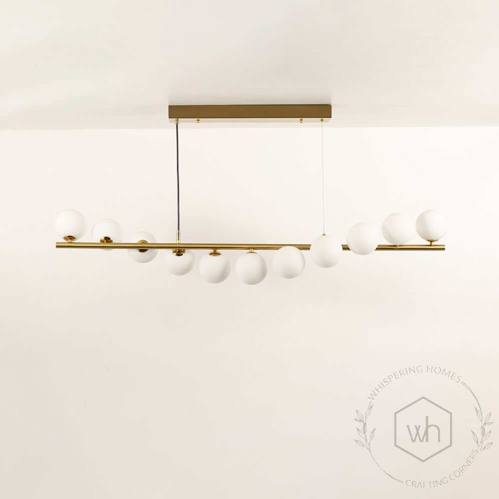 Ariella 11 Light Chandelier Gold Light Off White Background