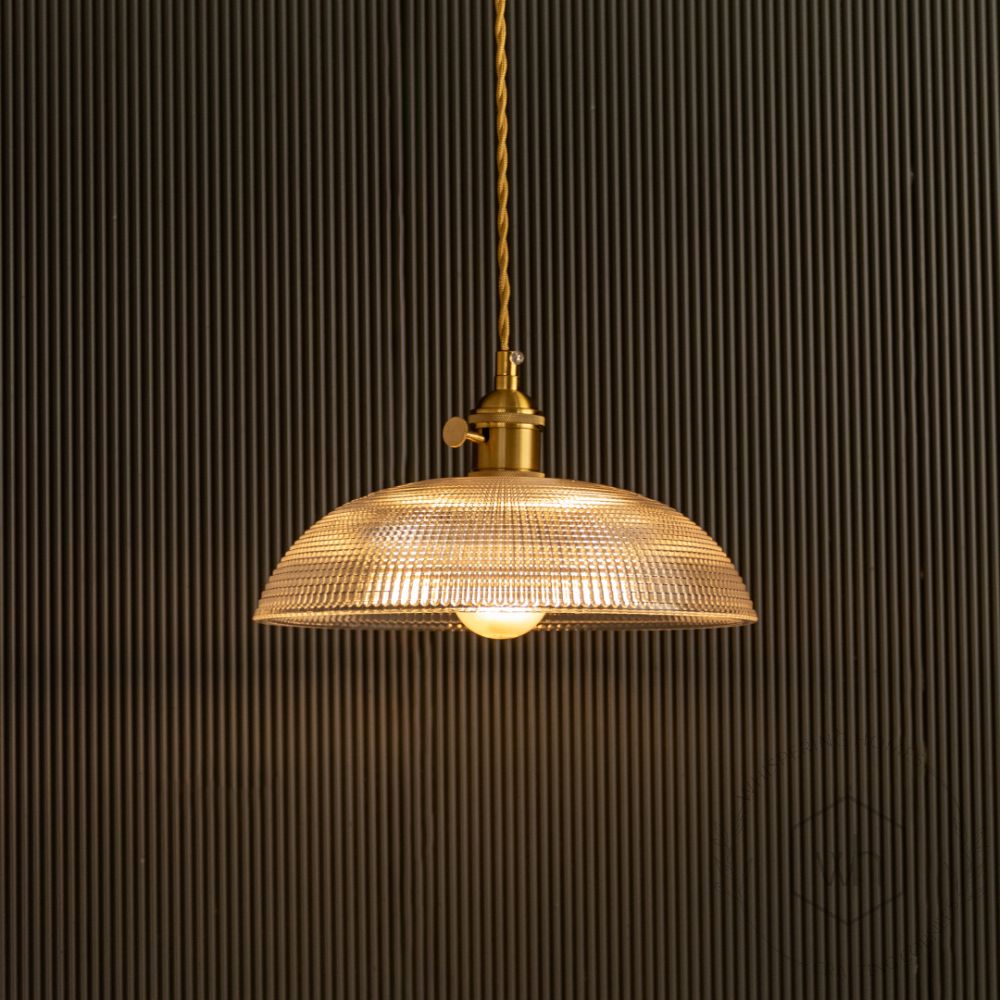 Prismatic Brass Glass Pendant Lamp Light On Black Background