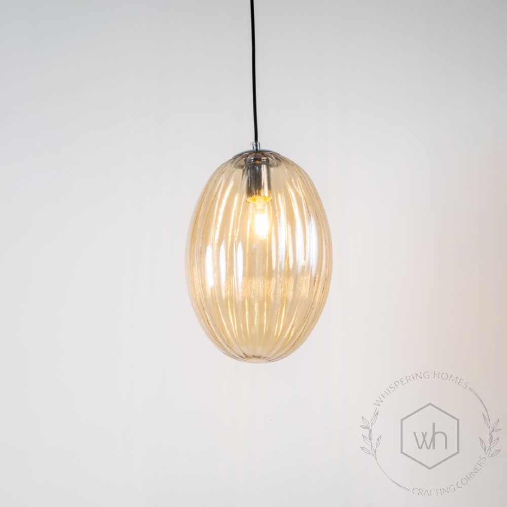 Glass Pendant Light - Oval & Amber Light On White Background