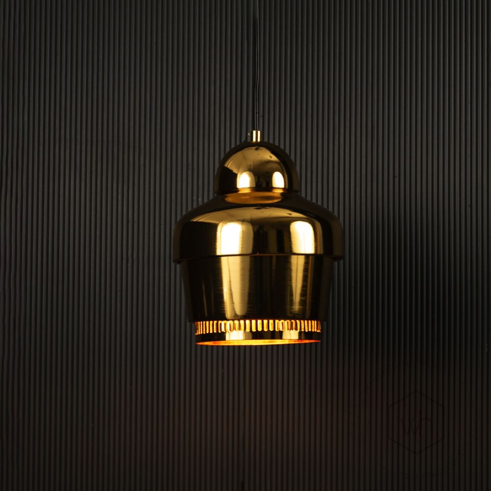 Rodan Pendant Light - Gold Light on black background