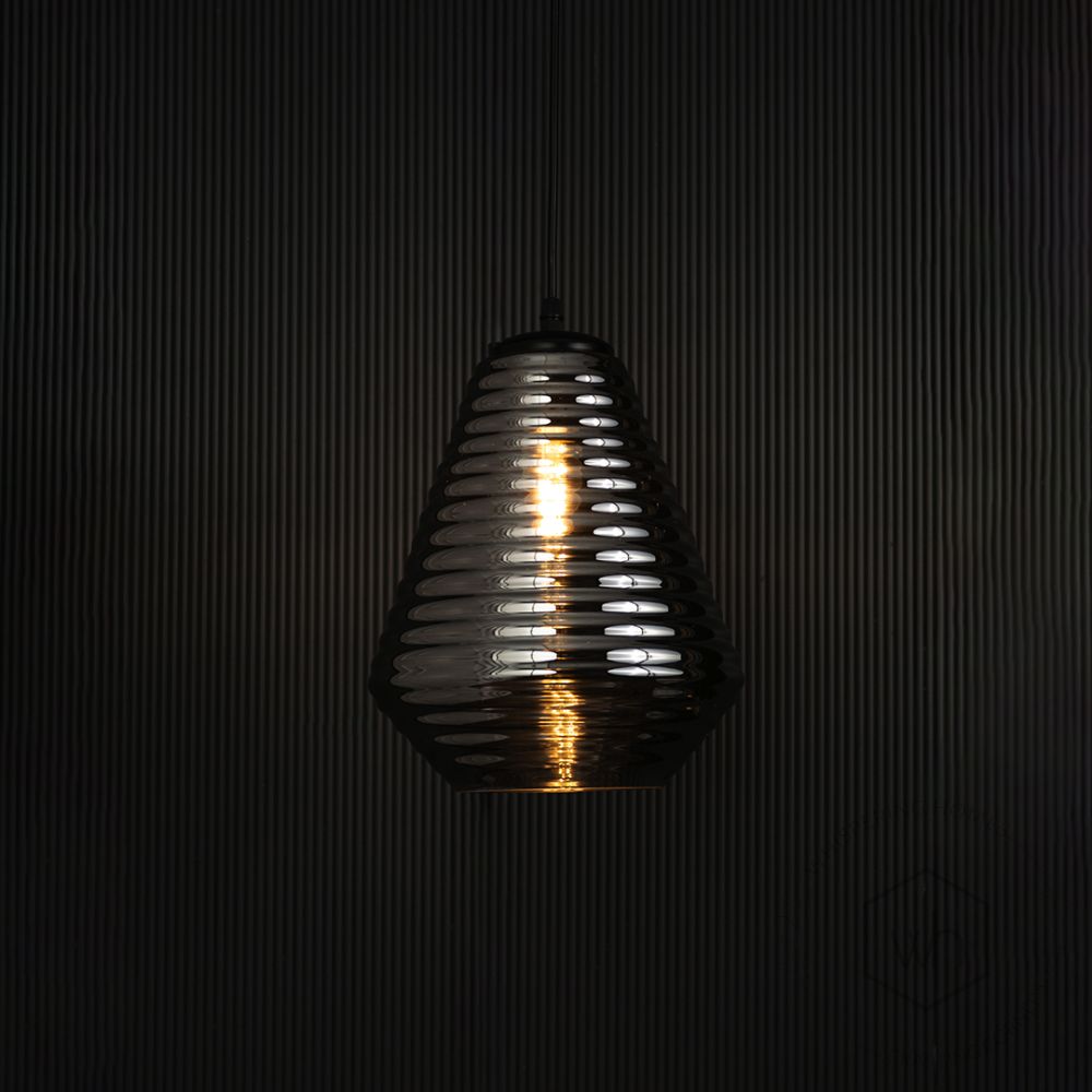 Camber Ribbed Glass Pendant Light Light on black background