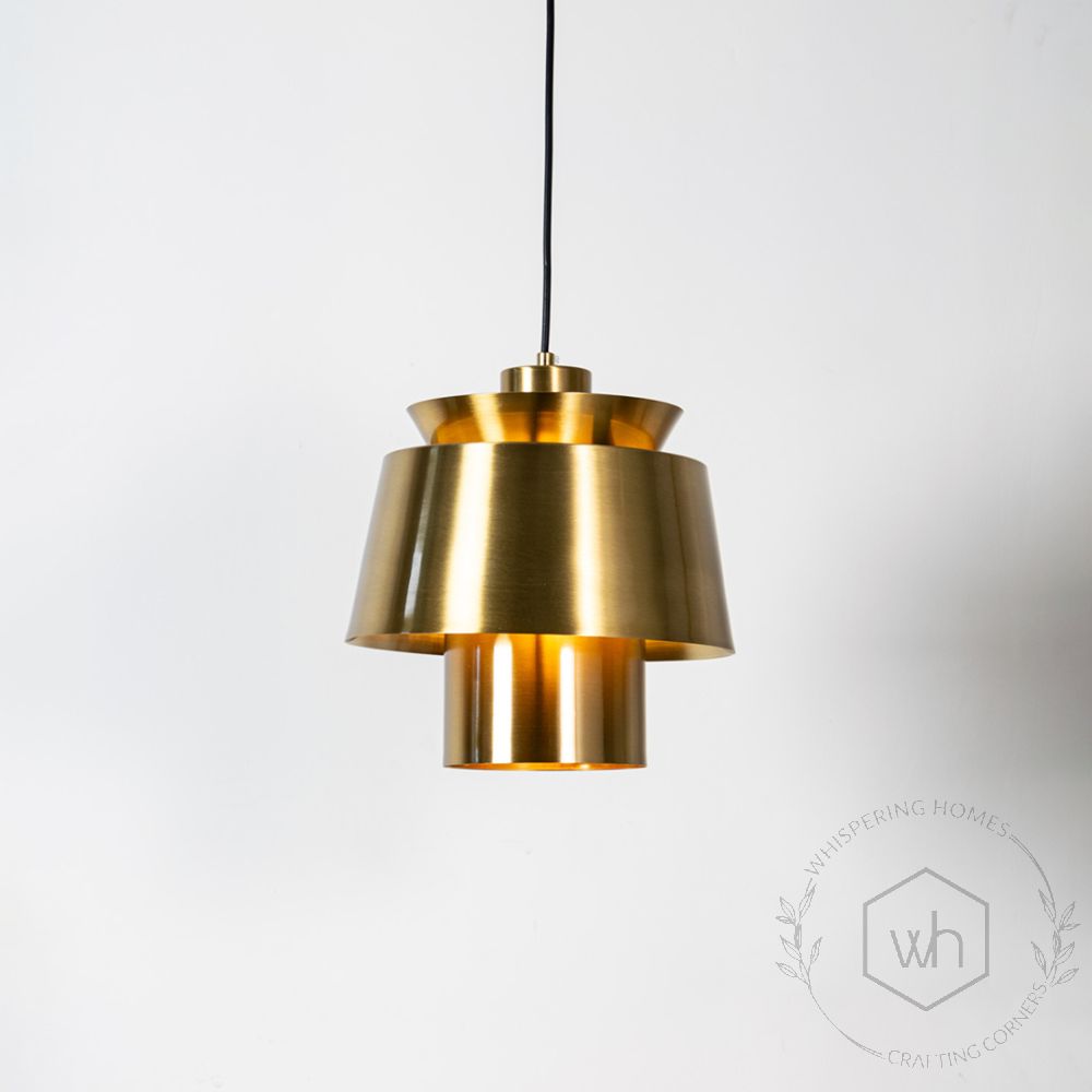 Lotta Metal Pendant Light - Gold Light On White Background