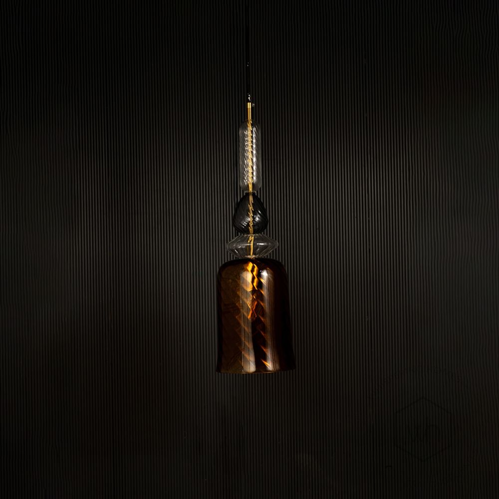 Amber Allure Pendant Light- Brown Light off black background