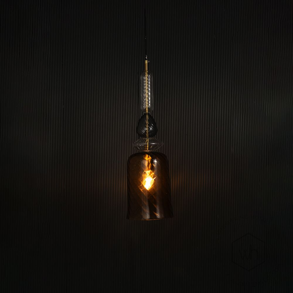 Amber Allure Pendant Light- Brown Light on black background