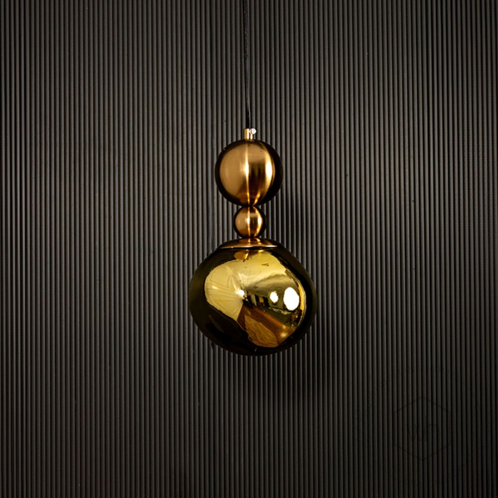 Umbra Pendant Light - Gold Light off black background