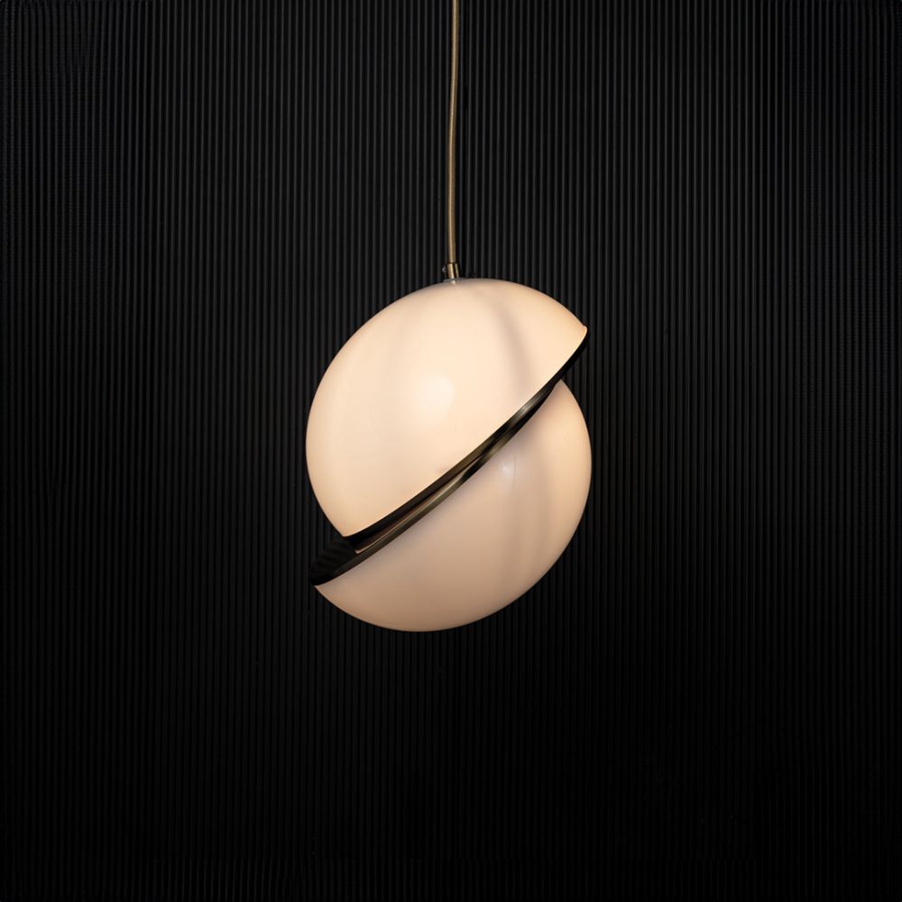 Gilded Ball Pendant Light Light On Black Background