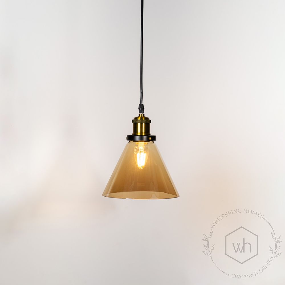 Bell Glass Pendant Light - Amber Light On White Background