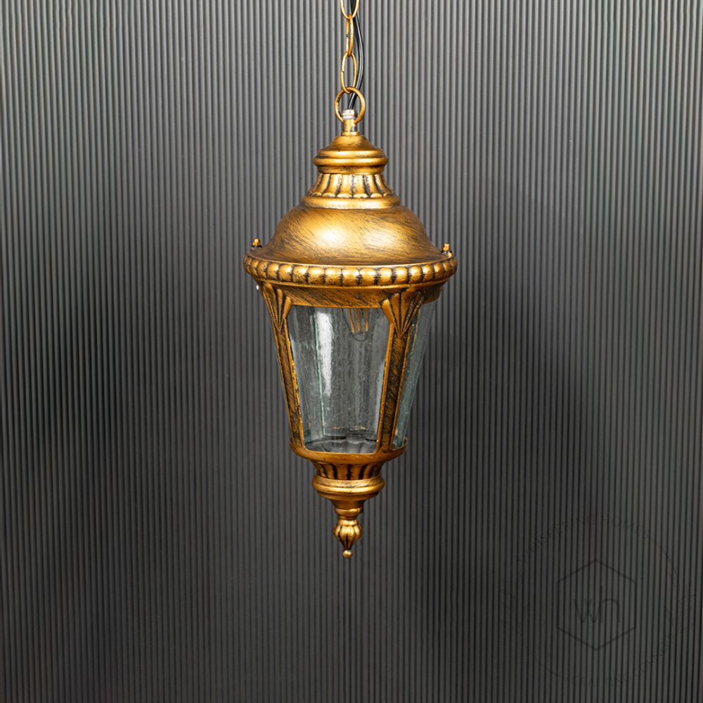 Traditional Outdoor Hanging Lamp - Gold Light Off Black Background