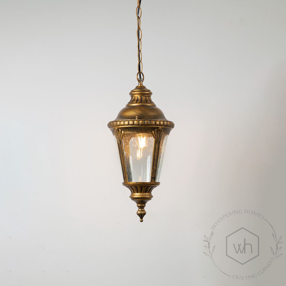 Traditional Outdoor Hanging Lamp - Gold Light On White Background