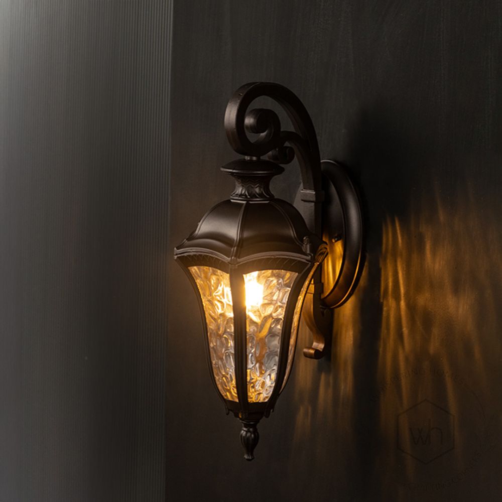 Bosom Outdoor Wall Light - Dark Brown Light On Black Background