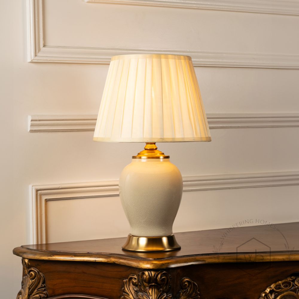 Porcelain Cream Ceramic Table Lamp with White Shade Light On White Background