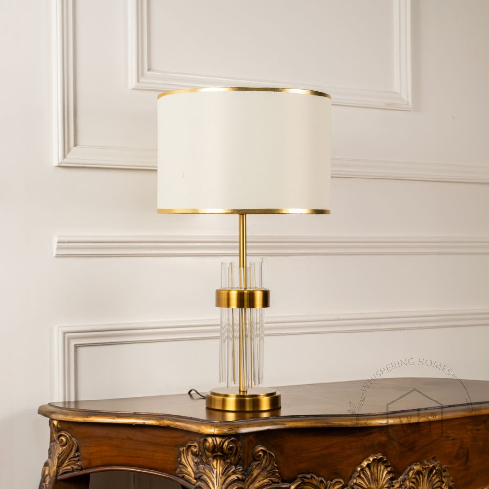 Skylo Gold Metallic Table Lamp with White Shade Light Off White Background