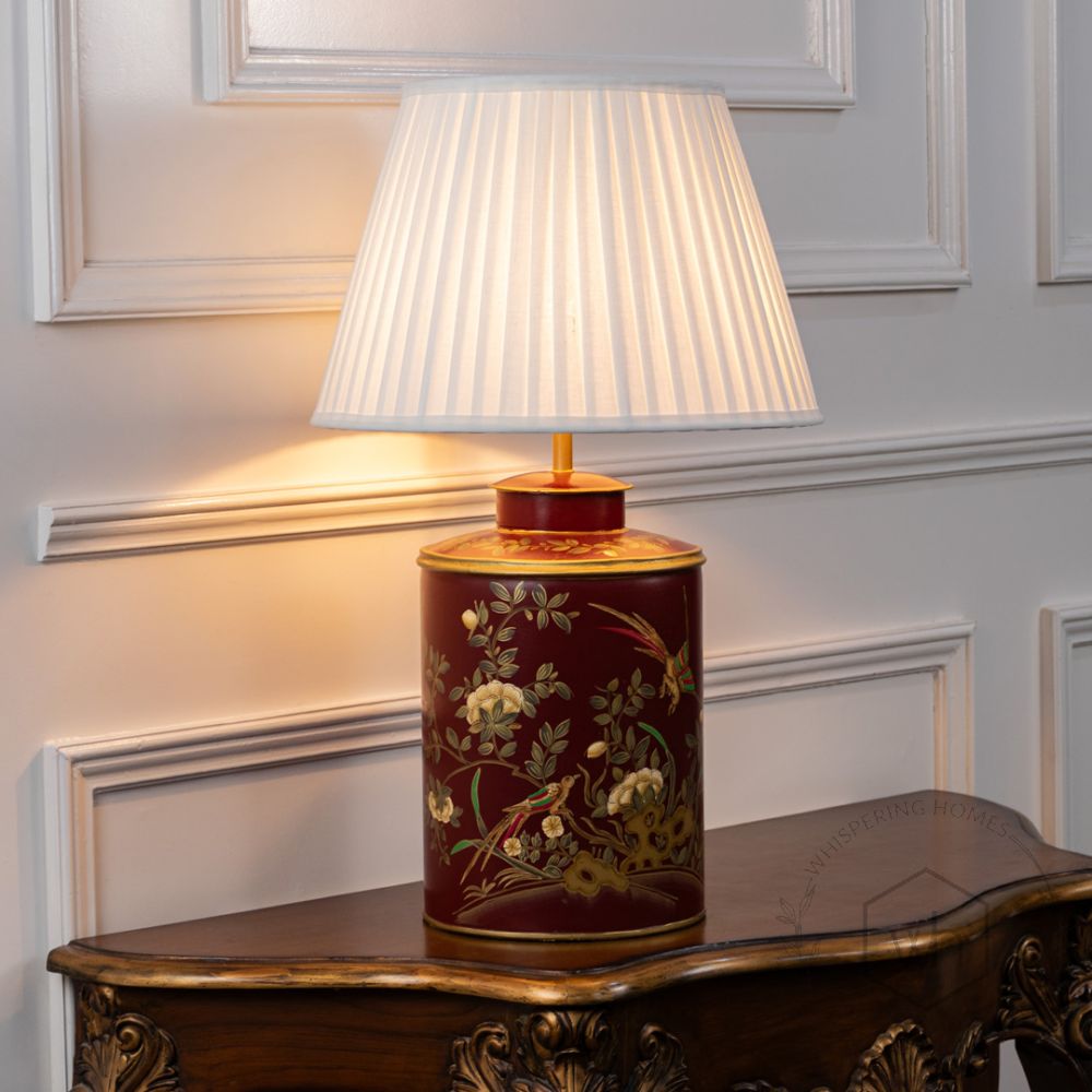 Gilded Phoenix Red Metal Table Lamp with White Pleated Lamp shade Light On White Background