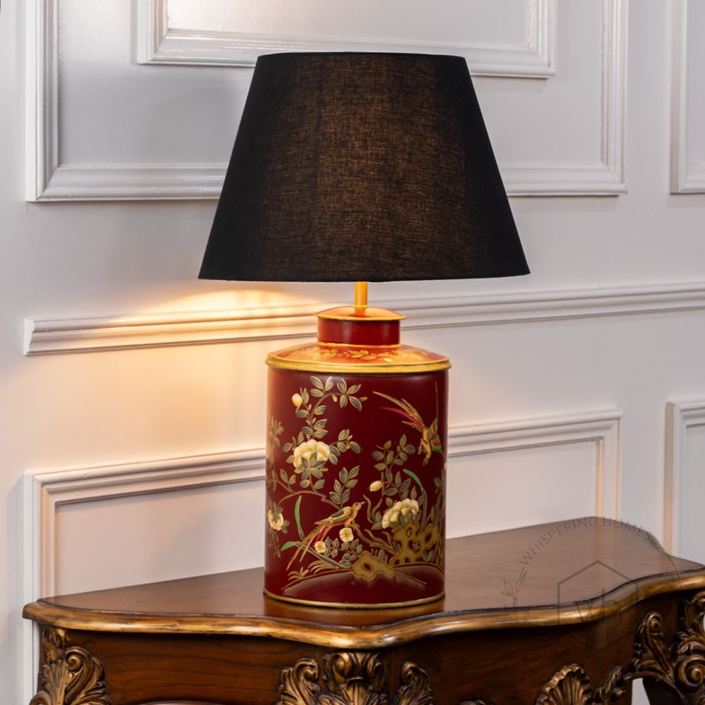 Gilded Phoenix Red Metal Table Lamp with Black Linen Lamp shade Light On White Background