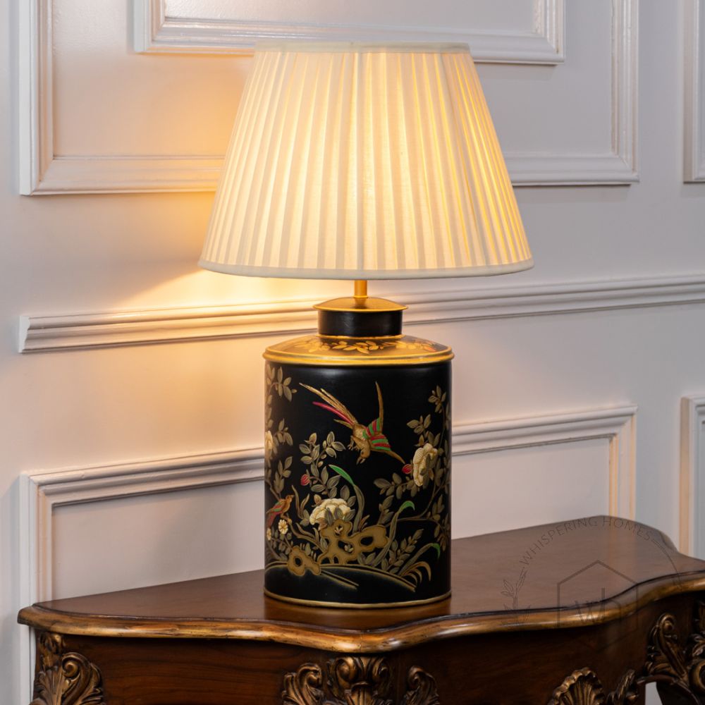 Gilded Phoenix Black Metal Table Lamp with Off White Pleated Lamp shade Light On White Background