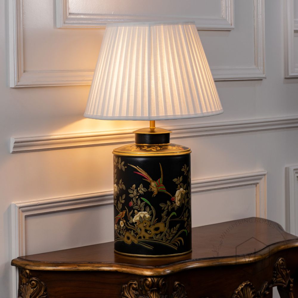 Gilded Phoenix Black Metal Table Lamp with White Pleated Lamp shade Light On White Background