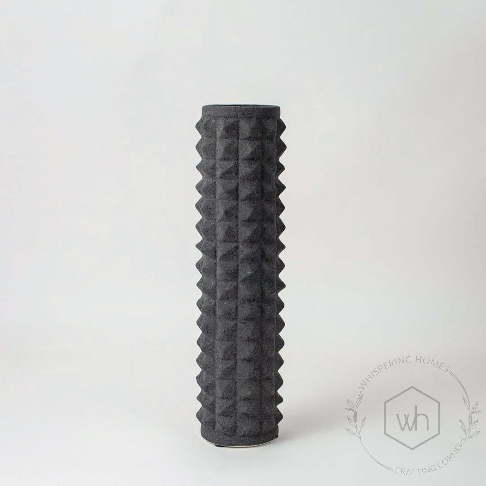 Doted Long Black Ceramic Vase White Background