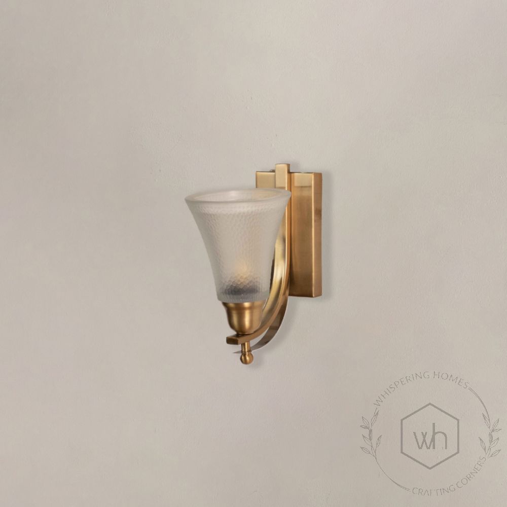 Crown Jewel Brass Sconce light off white background