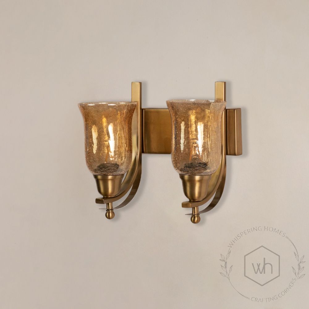 Crown Jewel Brass Double Sconce light off white background