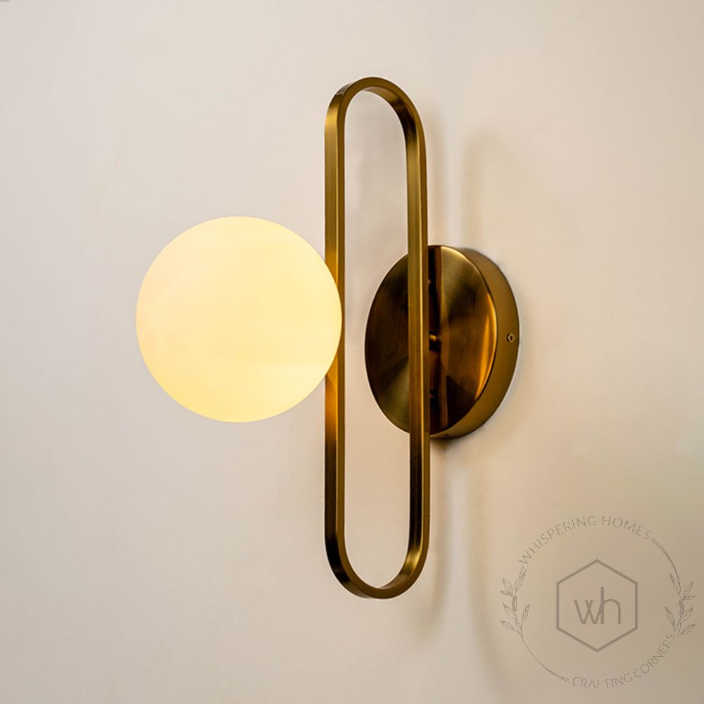 Oval Ring Wall Lamp - Brass & White Light On White Background