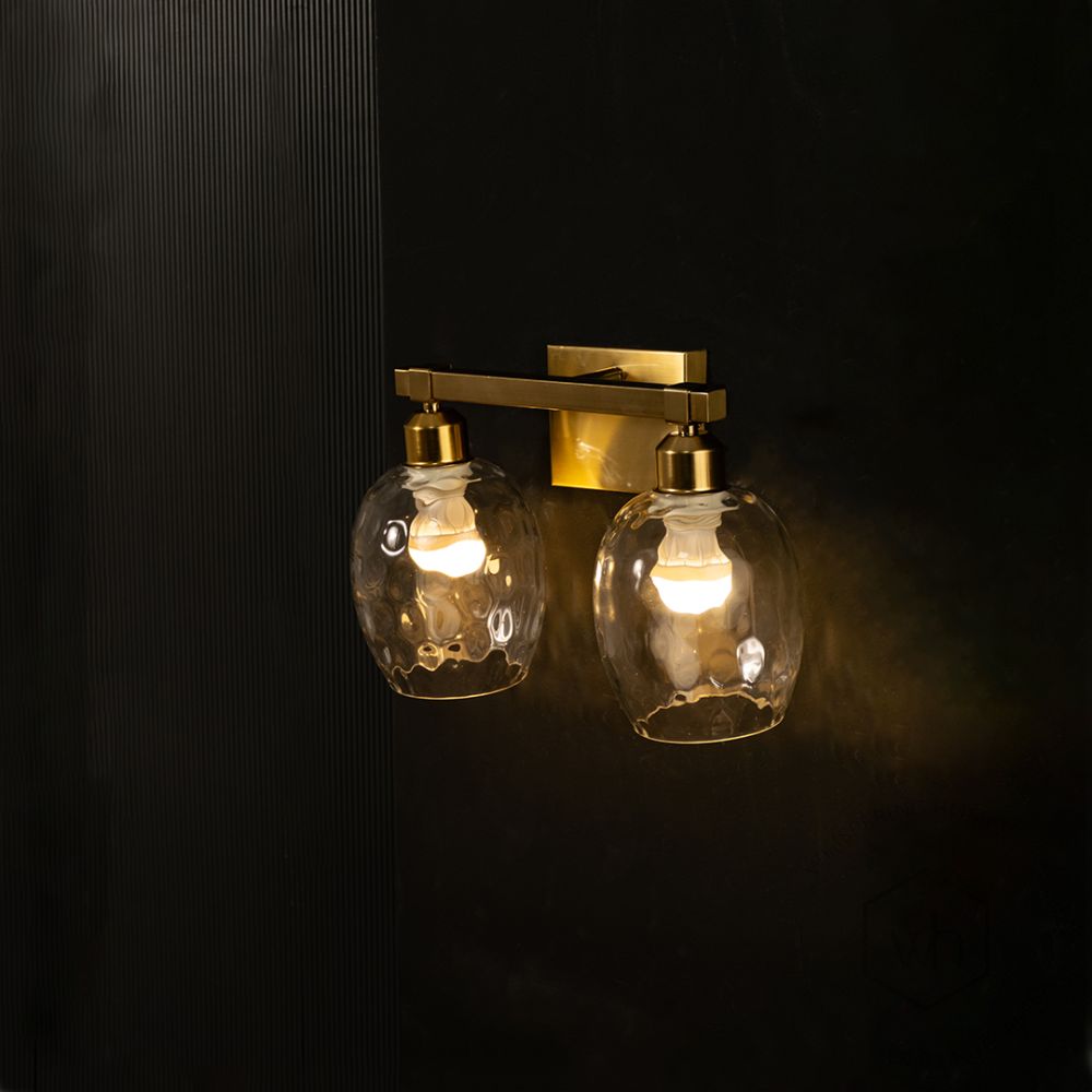 Double Valmont Vanity Light - Gold Light on black background