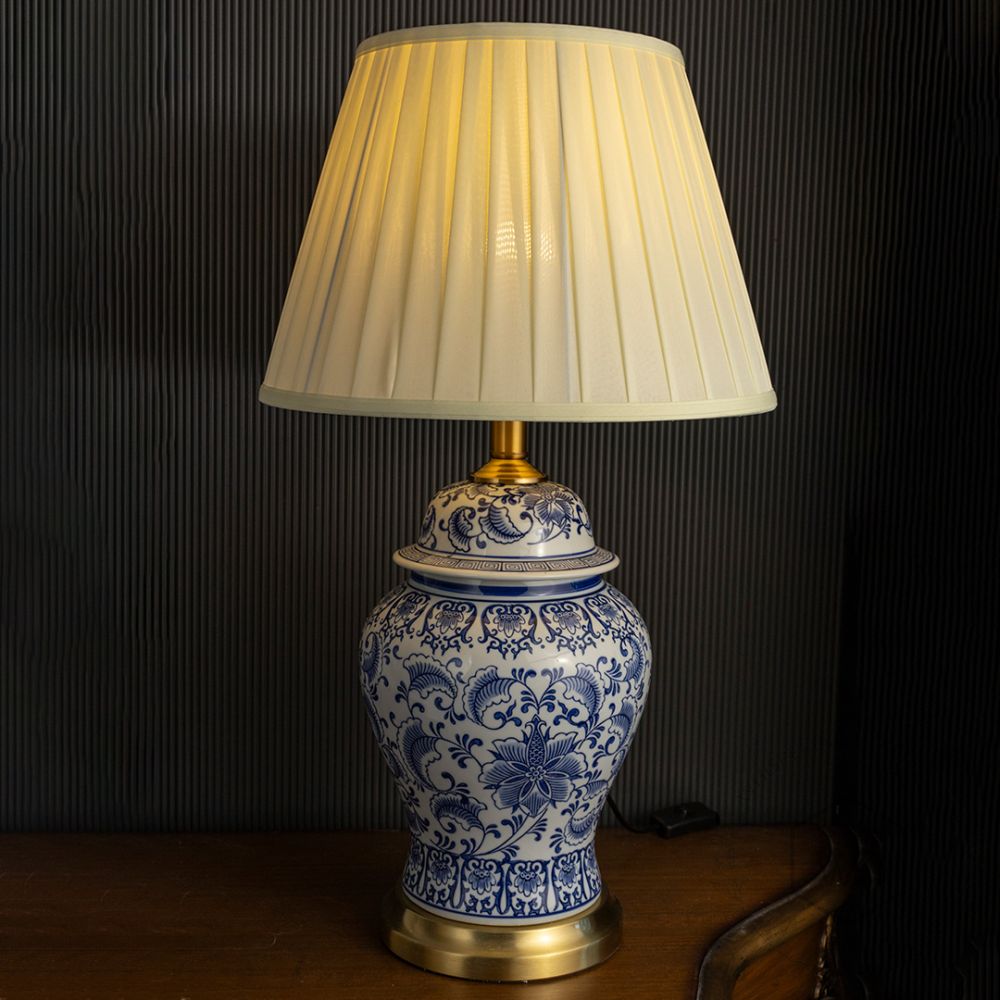 Blue & White Classic Table Lamp Light On Black Background