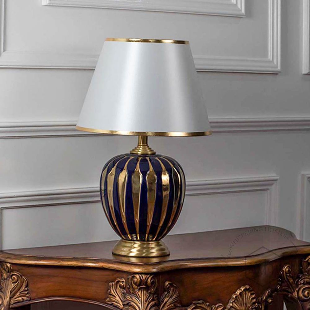 Cathenna Table Lamp - Gold & Dark Blue Light Off White Background