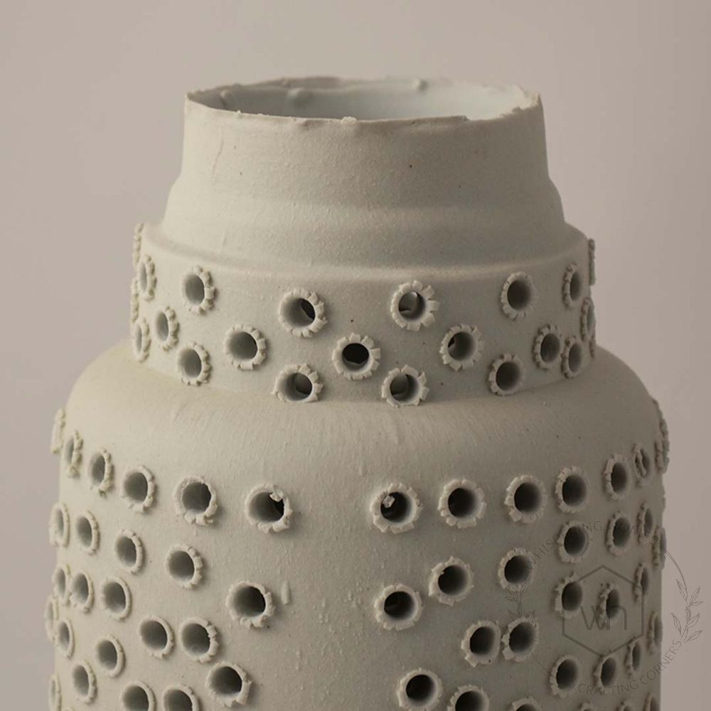 Ceramic Vase with Cutout Pattern Closeup