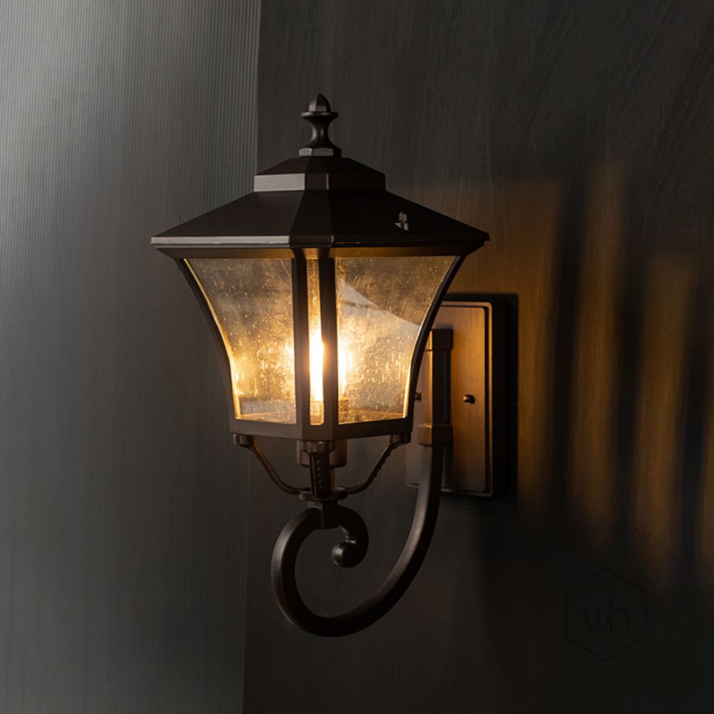 Chamber Outdoor Wall Light - Dark Brown Light On Black Background