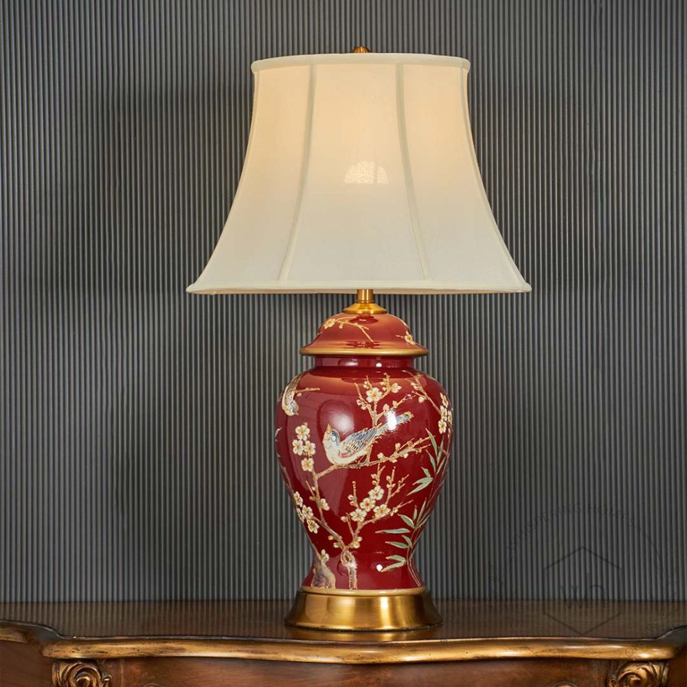 Elegance Glow Chinese Style Ceramic Table Lamp with White Shade - Red Light On Black Background