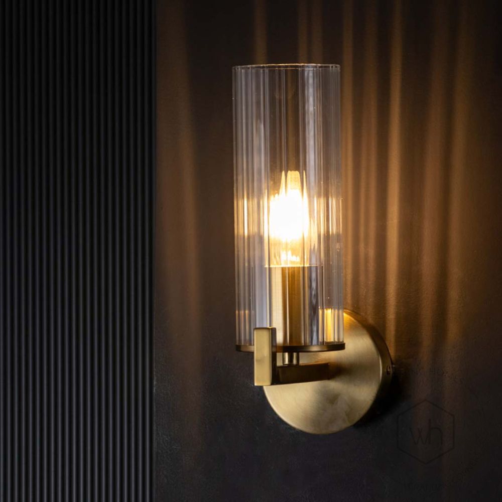 Evolve Single Nordic Style Modern Golden Metal & Glass Light Light On Black Background