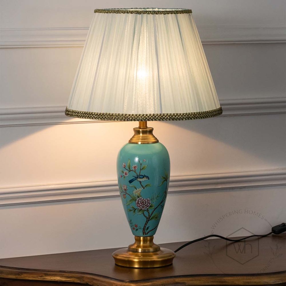 Flora Magic Ceramic Table Lamp - Blue Light On White Background