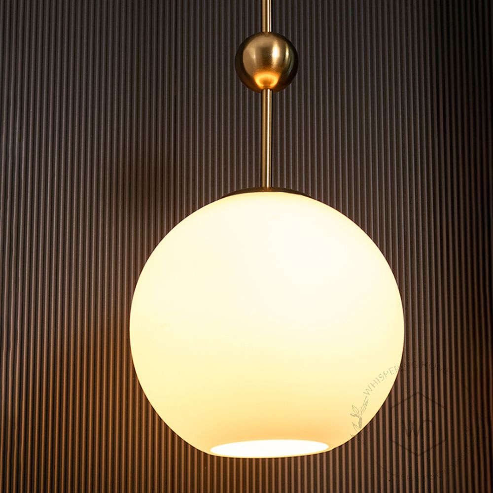 Frosted Glass Globe Gold Metal Pendant Light Light On Black Background