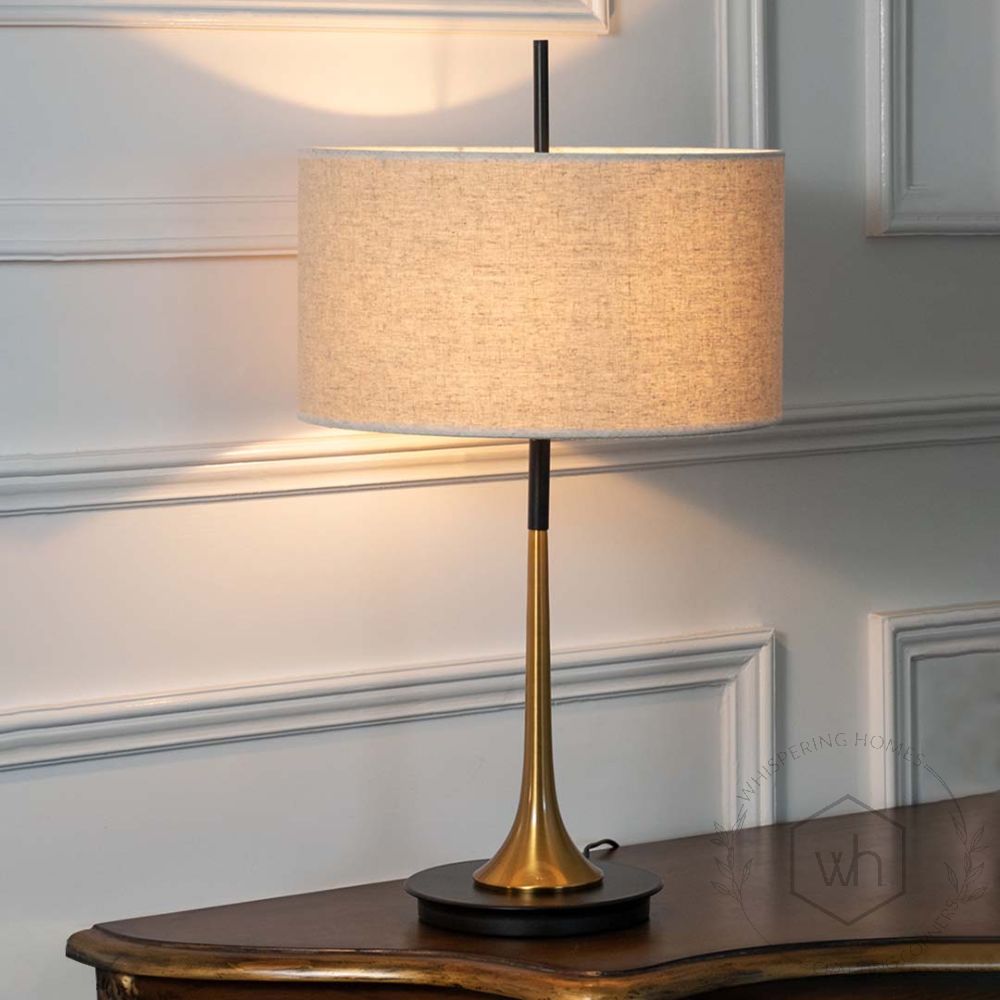 Lustroso Gold & Black Metal Table Lamp with White Shade Light On White Background