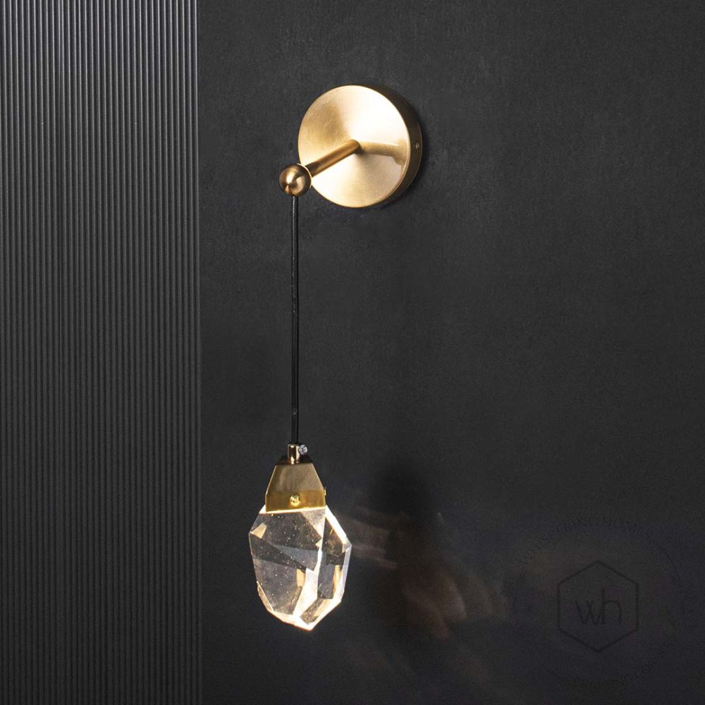 Sconce Crystal Wall Light - Brass & Clear Light On Black Background