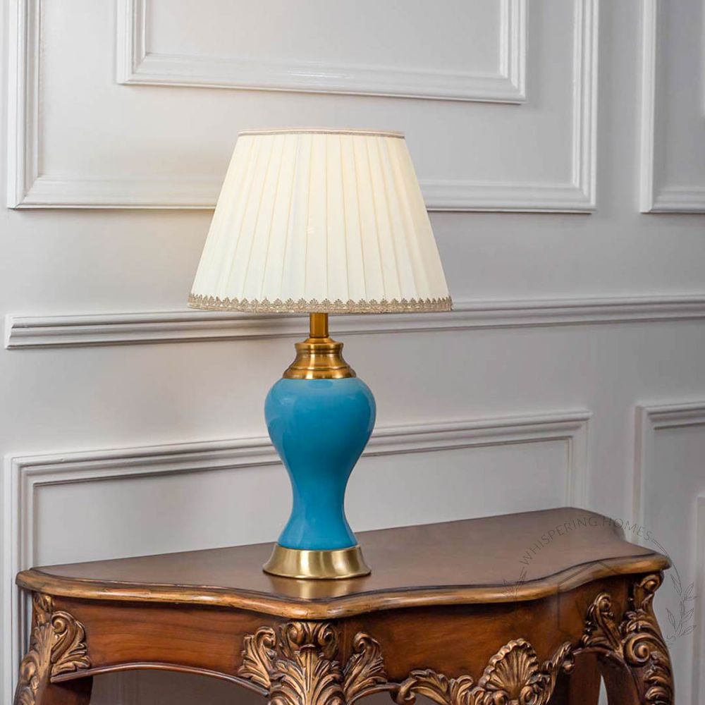 Maroq Table Lamp - Gold & Blue Light On White Background