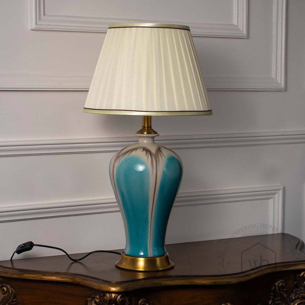 Modern Glazed Ceramic Table Lamp - Blue Light Off White Background