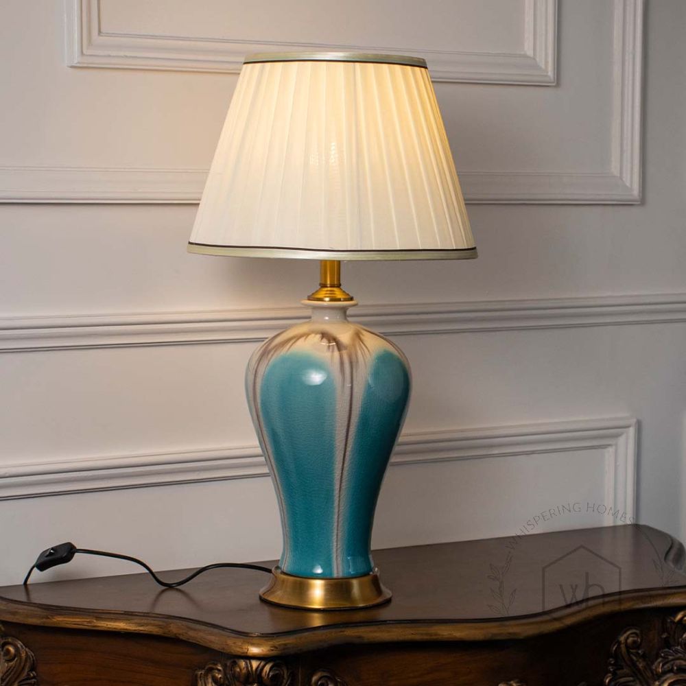 Modern Glazed Ceramic Table Lamp - Blue Light On White Background