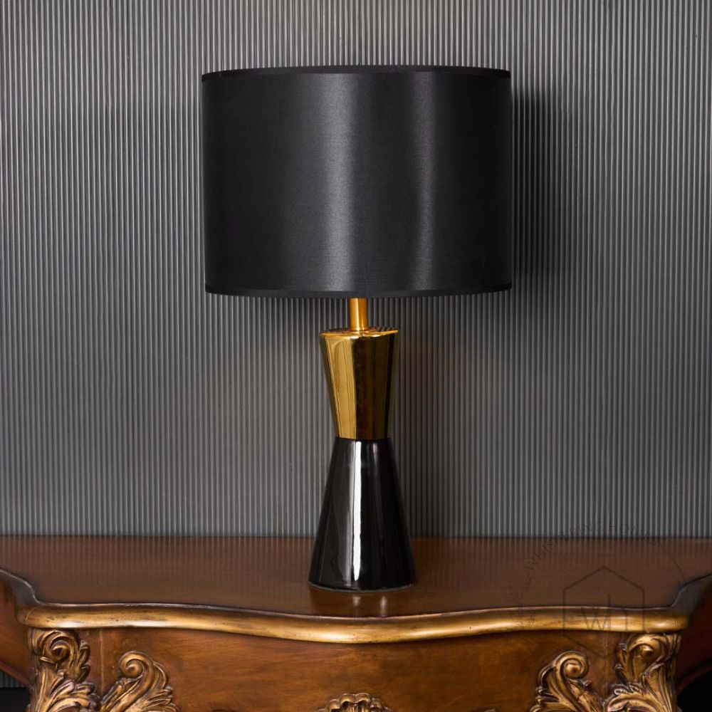 Wellen Black Ceramic Table Lamp with Black Shade Light On Black Background