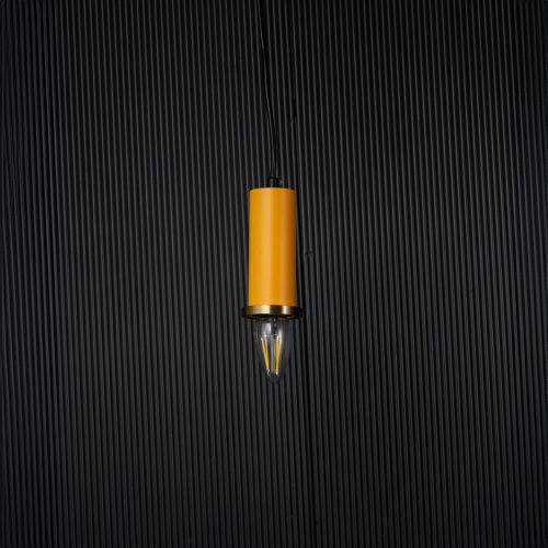 Long Chic Pendant Light - Yellow Light Off Black Background