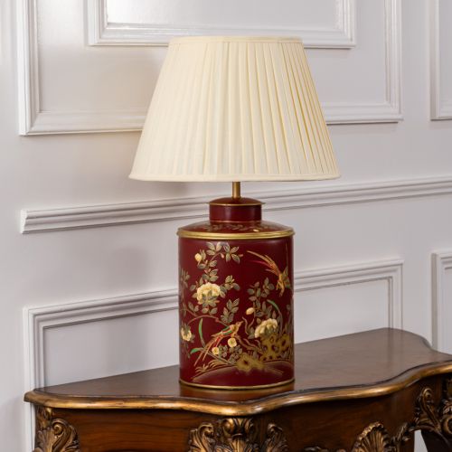 Gilded Phoenix Red Metal Table Lamp with Off White Pleated Lamp shade Light Off White Background