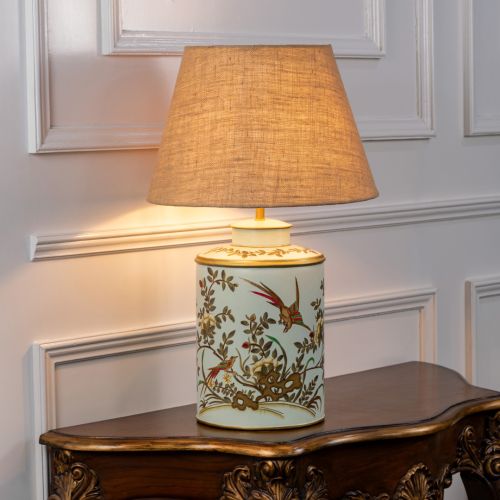 Gilded Phoenix Green Metal Table Lamp with Beige Linen Lamp shade Light On White Background