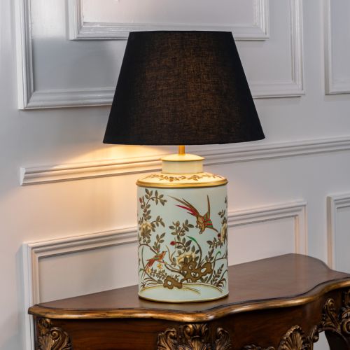 Gilded Phoenix Green Metal Table Lamp with Black Linen Lamp shade Light On White Background