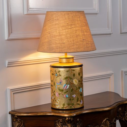 Oriental Orchard Gold Metal Table Lamp with Beige Linen Lamp shade Light On White Background