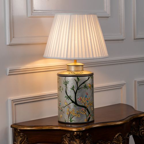 Oriental Orchard Silver Metal Table Lamp with White Pleated Lamp shade Light On White Background