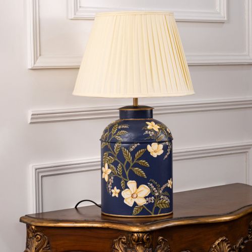 Plumeria Blue Metal Table Lamp with Off White Pleated Lamp shade Light Off White Background