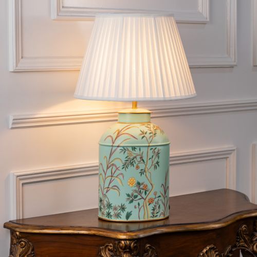 Tropical Garden Sky Blue Metal Table Lamp with White Pleated Lamp shade Light On White Background