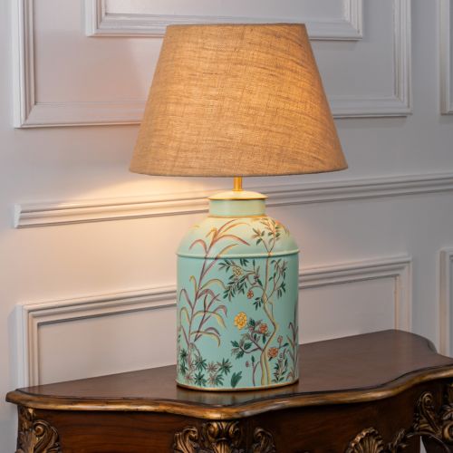 Tropical Garden Sky Blue Metal Table Lamp with Beige Linen Lamp shade Light On White Background